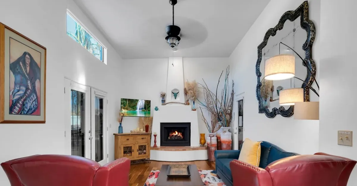 Tucson living room fireplace and seating viewed across a colorful rug